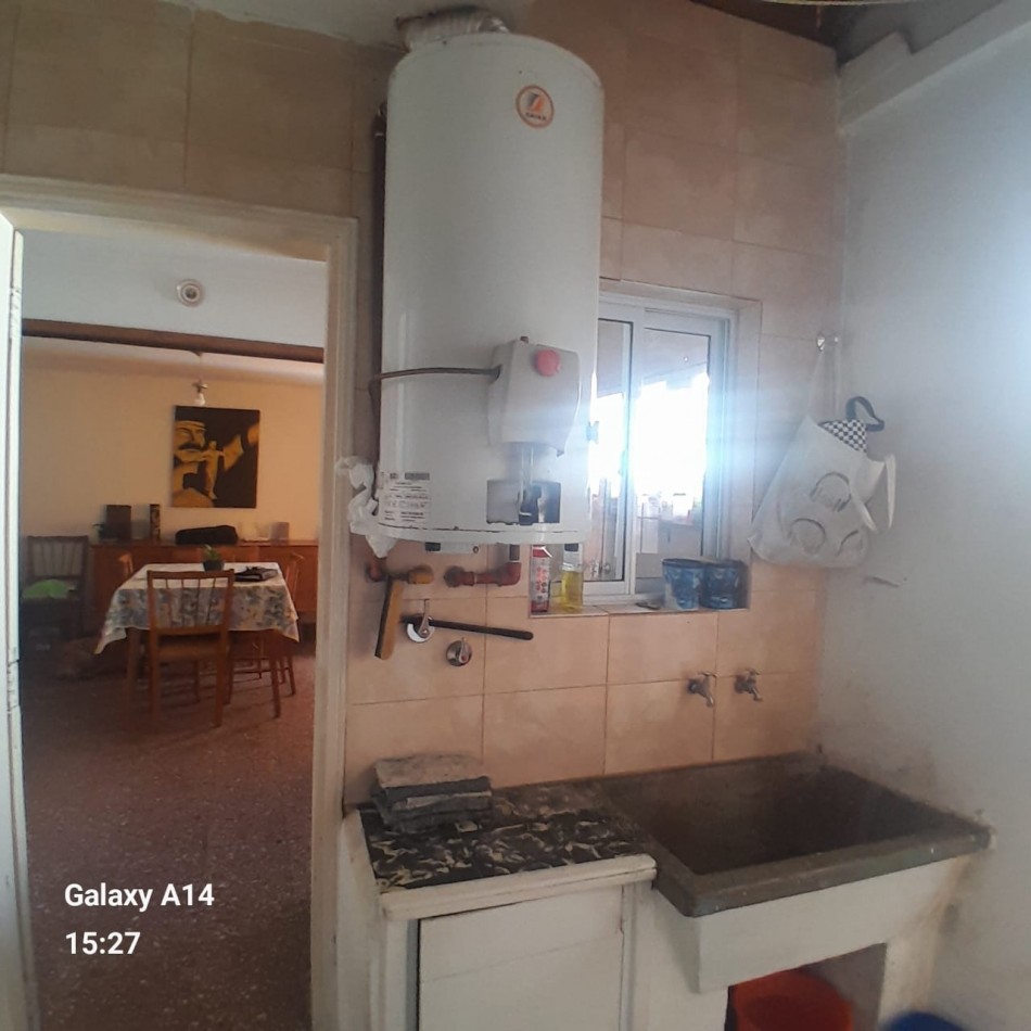 PH DE DOS AMBIENTES, POR PASILLO EN PLANTA BAJA