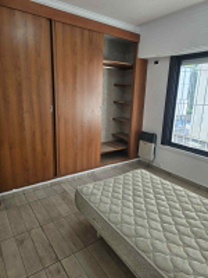 DEPARTAMENTO DE 2 AMBIENTES CON PATIO Y GARAGE
