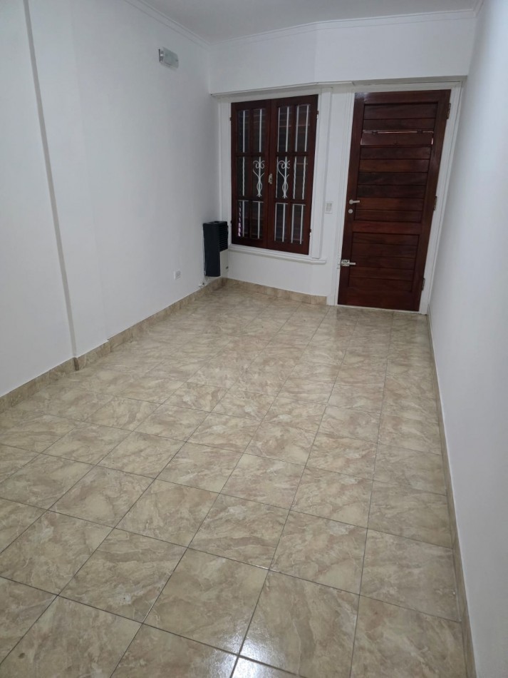 DEPARTAMENTO DE 2 AMBIENTES CON PATIO Y GARAGE