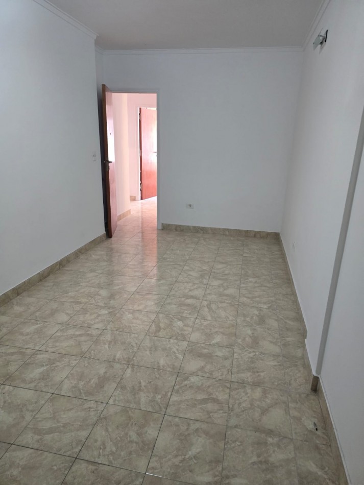 DEPARTAMENTO DE 2 AMBIENTES CON PATIO Y GARAGE