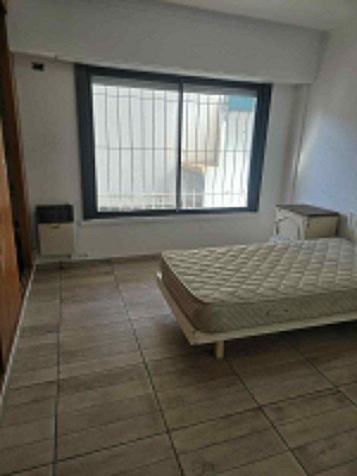 DEPARTAMENTO DE 2 AMBIENTES CON PATIO Y GARAGE