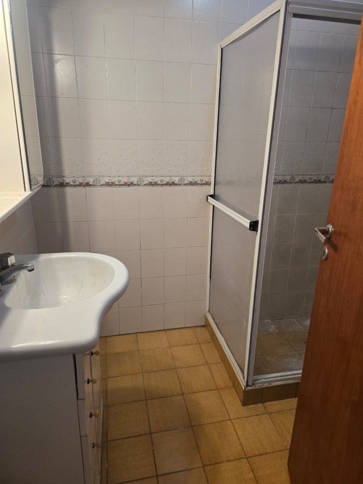 DEPARTAMENTO DE 2 AMBIENTES CON PATIO Y GARAGE